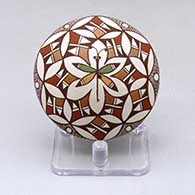 Click for a larger view A polychrome seed pot decorated with a dragonfly and geometric design
 by Diane Lewis of Acoma