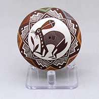Click for a larger view A polychrome seed pot decorated with an ancient Mimbres rabbit, fineline and geometric design
 by Diane Lewis of Acoma