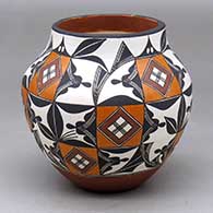 Click for a larger view A small jar decorated with a geometric design taken from a 1850s Acoma water jar
 by Lilly M Salvador of Acoma
