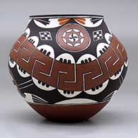 A polychrome jar decorated with a renewed design from 1885, click or tap to see a larger version