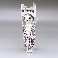 A polychrome Corn Maiden figure with a tablito and decorated with a lizard, kokopelli, lady bug, bird and geometric design
 by Judy Lewis of Acoma