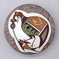 A polychrome seed pot decorated on top with a cloudeater, fish, fineline and geometric design
 by Diane Lewis of Acoma