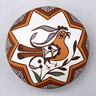 A polychrome seed pot decorated on top with a parrot, branch, leaf, fineline and geometric design
 by Diane Lewis of Acoma