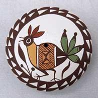 A polychrome seed pot decorated on top with a bird, leaf, branch and geometric design
 by Diane Lewis of Acoma