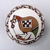 A polychrome seed pot decorated on top with a cloudeater, fish, fineline, checkerboard and geometric design
 by Diane Lewis of Acoma