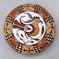 A polychrome seed pot decorated on top with a parrot, branch, leaf and geometric design
 by Diane Lewis of Acoma