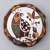 A polychrome seed pot decorated on top with a quail, branch, leaf and geometric design
 by Diane Lewis of Acoma