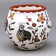 A polychrome jar decorated with multiple birds, plants, flowers and geometric design
 by Diane Lewis of Acoma