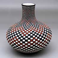 A polychrome jar with a short neck and decorated with a checkerboard and geometric design
 by Paula Estevan of Acoma