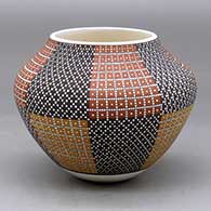 A polychrome jar decorated with an eight panel tiny squares geometric design
 by Frederica Antonio of Acoma