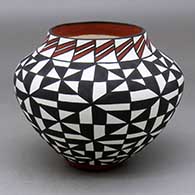 A polychrome jar decorated with a geometric design
 by Sandra Victorino of Acoma