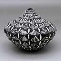 Click for a larger view A black on white tear drop jar decorated with a geometric design
 by Sandra Victorino of Acoma