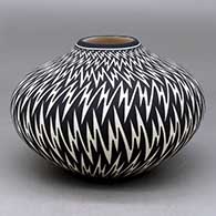 Click for a larger view A black on white jar decorated with a lightning bolt geometric design
 by Paula Estevan of Acoma