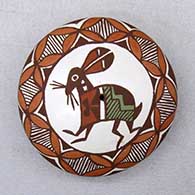 Click for a larger view A polychrome seed pot decorated with an ancient Mimbres rabbit, fineline and geometric design
 by Diane Lewis of Acoma
