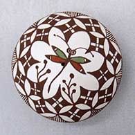 Click for a larger view A polychrome seed pot decorated with a dragonfly and geometric design
 by Diane Lewis of Acoma