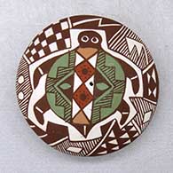 Click for a larger view A polychrome seed pot decorated with a turtle, checkerboard, fineline and geometric design
 by Diane Lewis of Acoma