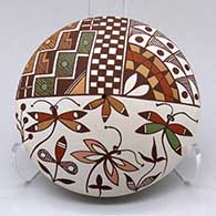 Click for a larger view A polychrome seed pot decorated with a dragonfly, flower, checkerboard and geometric design
 by Diane Lewis of Acoma