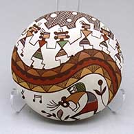 Click for a larger view A polychrome seed pot decorated with a kokopelli, pueblo dancer, rainbow, fineline and geometric design
 by Diane Lewis of Acoma