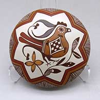 Click for a larger view A polychrome seed pot decorated with a bird, branch and geometric design
 by Diane Lewis of Acoma