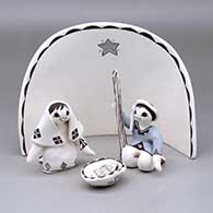 A four piece Acoma style nativity scene
 by Judy Lewis of Acoma