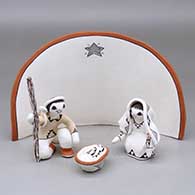 A four piece Acoma style nativity scene
 by Judy Lewis of Acoma