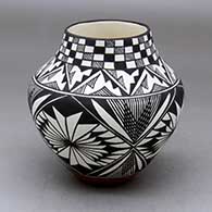 A polychrome jar decorated with a medallion, fineline, checkerboard and geometric design
 by Sandra Victorino of Acoma