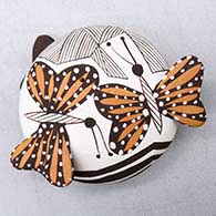 A miniature polychrome seed pot decorated with painted butterfly appliques and a fineline and geometric design
 by Alisha Sanchez of Acoma