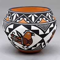 A small polychrome jar decorated with a turtle, parrot and geometric design
 by Marilyn Ray of Acoma