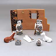 A seven piece Nativity set with a wall
 by Marilyn Ray of Acoma