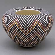 A polychrome jar with an Infinity rim and decorated with a herringbone and tiny squares geometric design
 by Frederica Antonio of Acoma