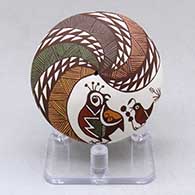 A miniature polychrome seed pot decorated above the shoulder with a quail, fineline and geometric design
 by Diane Lewis of Acoma