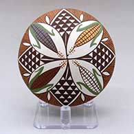 A polychrome seed pot decorated above the shoulder with an ear of corn and geometric design
 by Diane Lewis of Acoma