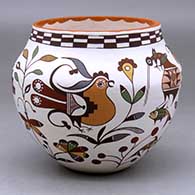 A polychrome jar decorated with birds, fish, butterflies, flowers and geometric design
 by Diane Lewis of Acoma