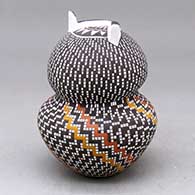 A polychrome owl figure decorated with a tiny square and geometric design, click or tap to see a larger version