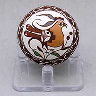 A miniature polychrome seed pot decorated with a parrot, branch, flower, fineline and geometric design
 by Diane Lewis of Acoma
