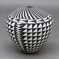A black on white seed pot decorated with a spiral mesa, rain cloud and geometric design
 by Cletus Victorino of Acoma