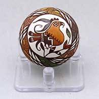 A miniature polychrome seed pot decorated with a parrot, branch, fineline and geometric design
 by Diane Lewis of Acoma