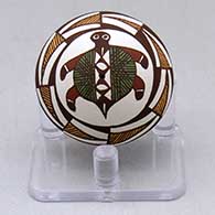 A miniature polychrome seed pot decorated with a turtle, fineline and geometric design
 by Diane Lewis of Acoma