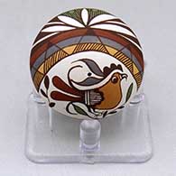 A miniature polychrome seed pot decorated with a parrot, branch, rainbow, fineline and geometric design
 by Diane Lewis of Acoma