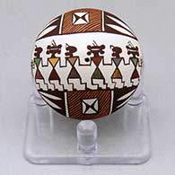 A miniature polychrome seed pot decorated with a women dancer, fineline and geometric design
 by Diane Lewis of Acoma