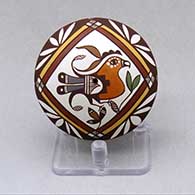 A polychrome seed pot decorated with a parrot, plant, rainbow and geometric design
 by Diane Lewis of Acoma