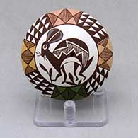 A polychrome seed pot decorated with a Mimbres rabbit, plant, rain cloud and geometric design
 by Diane Lewis of Acoma