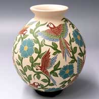 Polychrome jar with a rolled lip and a sgraffito and painted parrot, branch and flower design
 by Sandra Lorena Arras of Mata Ortiz and Casas Grandes