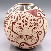 Polychrome jar with a sgraffito optical illusion African wildlife and geometric design
 by Abraham Rodriguez of Mata Ortiz and Casas Grandes