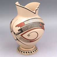 Polychrome jar with a terrace-cut neck and a 2-panel geometric design plus a custom matching stand
 by Cesar Bugarini of Mata Ortiz and Casas Grandes