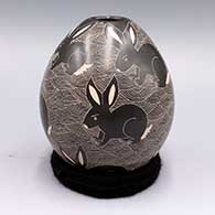 Black jar with sgraffito rabbit and geometric design
 by Alex Ortega of Mata Ortiz and Casas Grandes