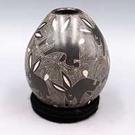 Black jar with sgraffito rabbit and geometric design
 by Alex Ortega of Mata Ortiz and Casas Grandes