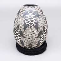 Black and white jar with a sgraffito sea turtle and geometric design
 by Alex Ortega of Mata Ortiz and Casas Grandes