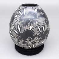 Black and white jar with a sgraffito rabbit and geometric design
 by Alex Ortega of Mata Ortiz and Casas Grandes