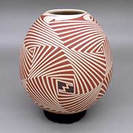 Polychrome jar with a geometric design
 by Rodrigo Perez of Mata Ortiz and Casas Grandes